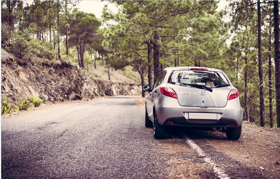 people using a rental car on vacation